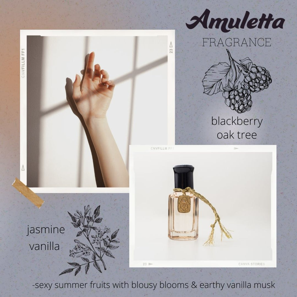 Amuletta's La Mûre fragrance. Blackberry, peach, jasmine, lavender & vanilla. In a blush bottle with a hamsa hand gold filled tag attached with gold braided embroidery thread.  Auratae Candles