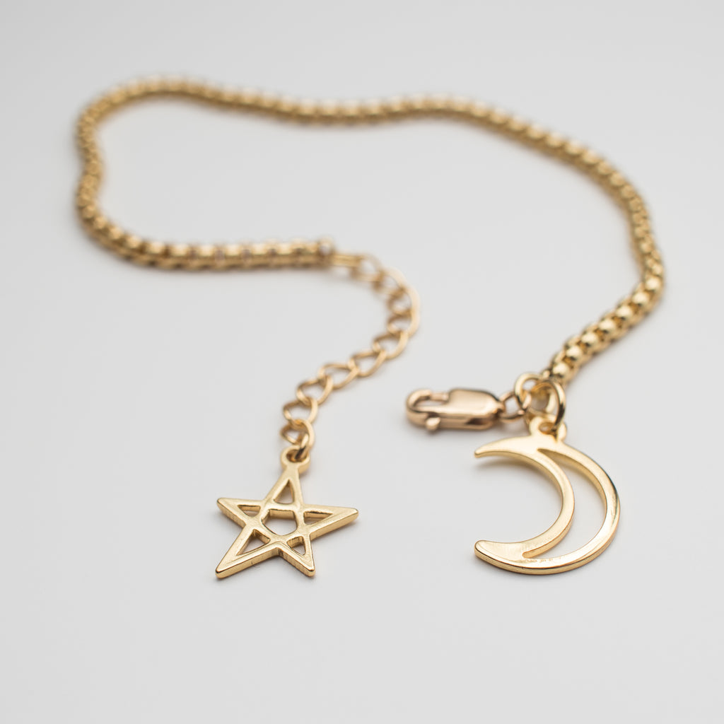 Gold star and moon charm bracelet lobster clasp style