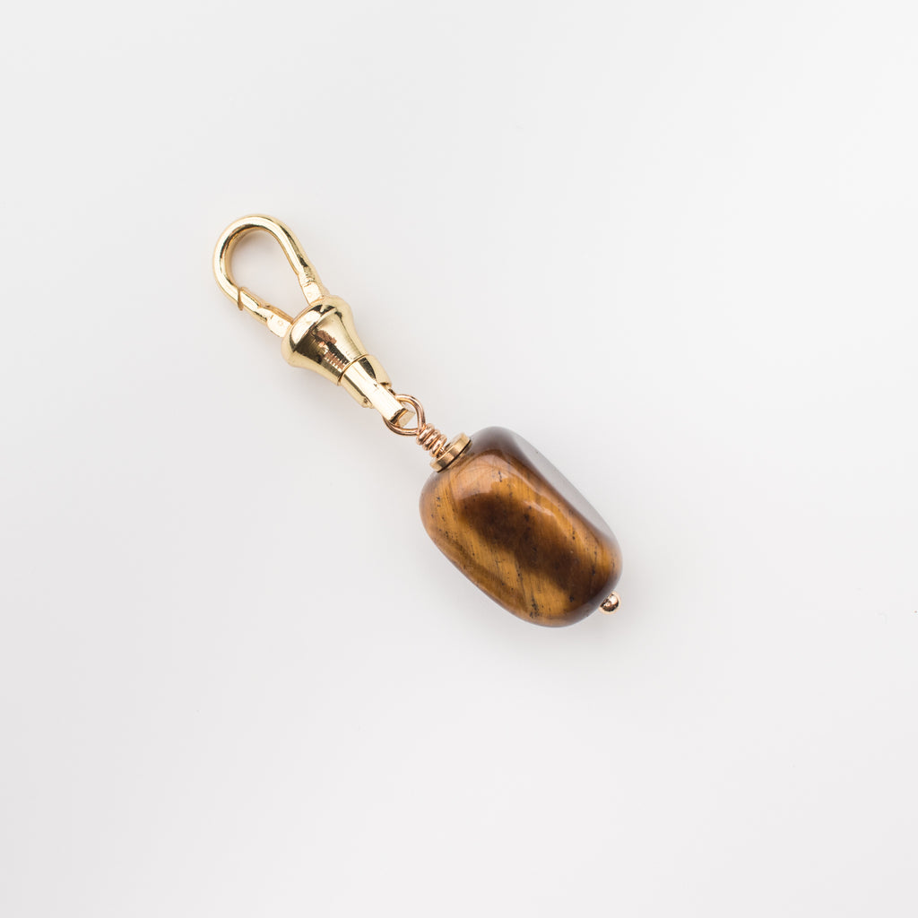 Brown tiger's eye gemstone charm on a gold latch for a dog leash, dog collar, handbag, change purse, on the go lululemon bag and key chain. 