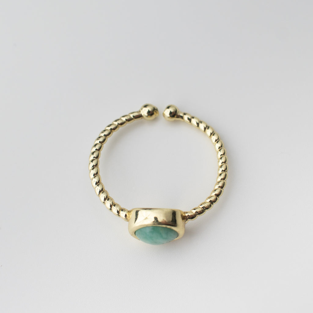 Gold twisted adjustable ring with a green teal gemstone agate centre. 
