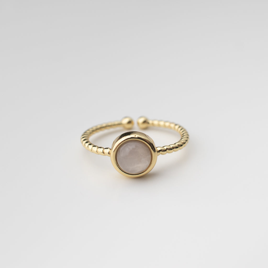 Gold twisted friendship ring with a milky grey gemstone agate centre. 