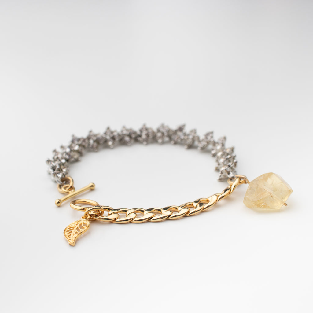 Citrine bracelet with recycled rhinestone chain,  18k gold plated 925 sterling silver toggle clasp and leaf,  faceted yellow citrine gemstone and 18k gold plated new chain. 