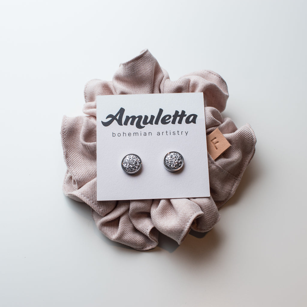 Silver Stud Earrings with Silver Resin Druzy on a Amuletta card.