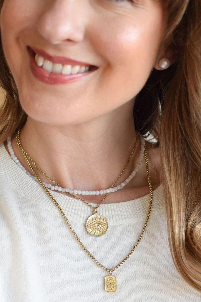 Model Marlenka is wearing Gold Eye Pendant Necklace in Short Style instagram lefranks