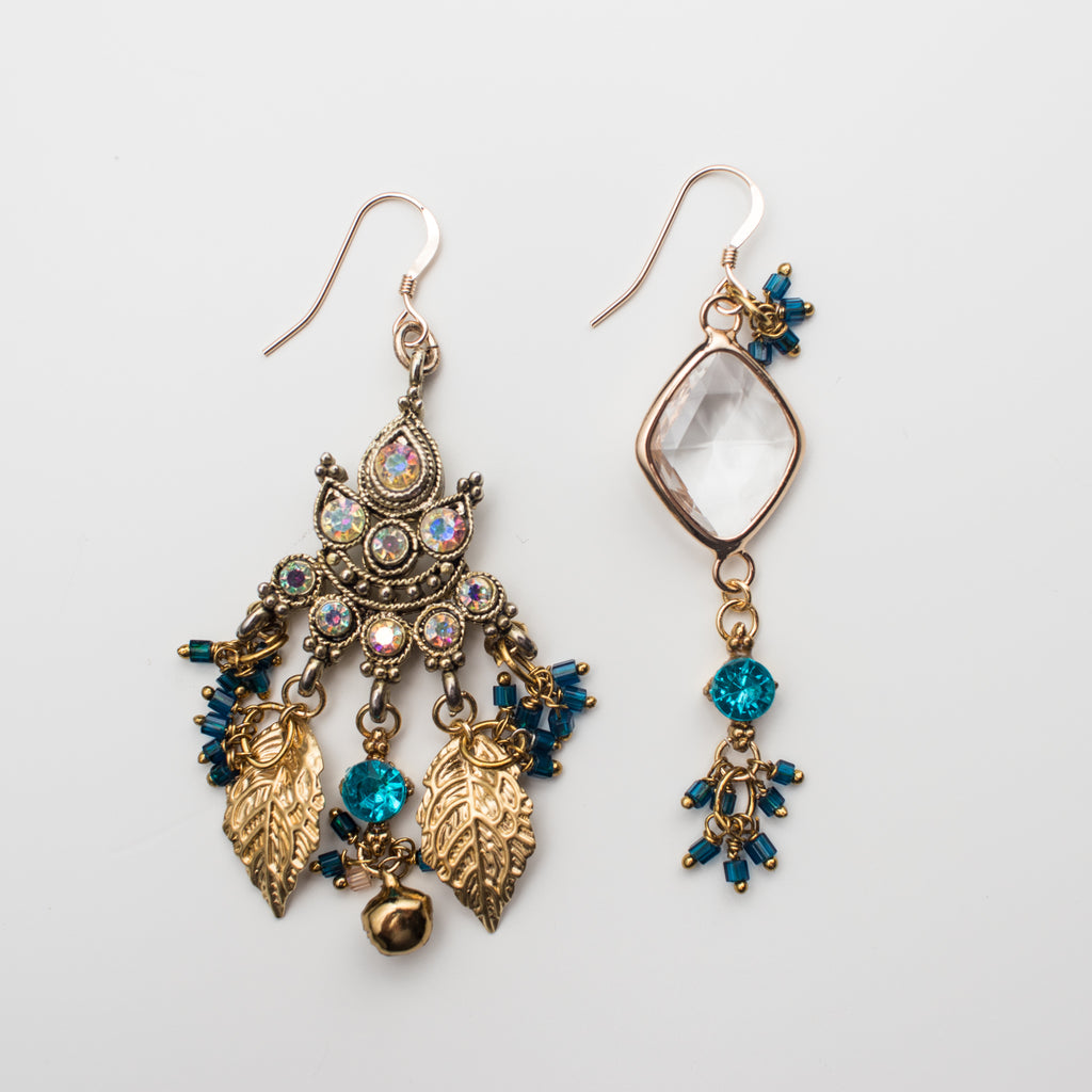 Gold Chandelier Earrings with teal, gold leaves and a clear crystal in a Mismatch upcycle amuletta amulet amulette style jewelry jewellery, handmade bespoke bohemian boho quality.