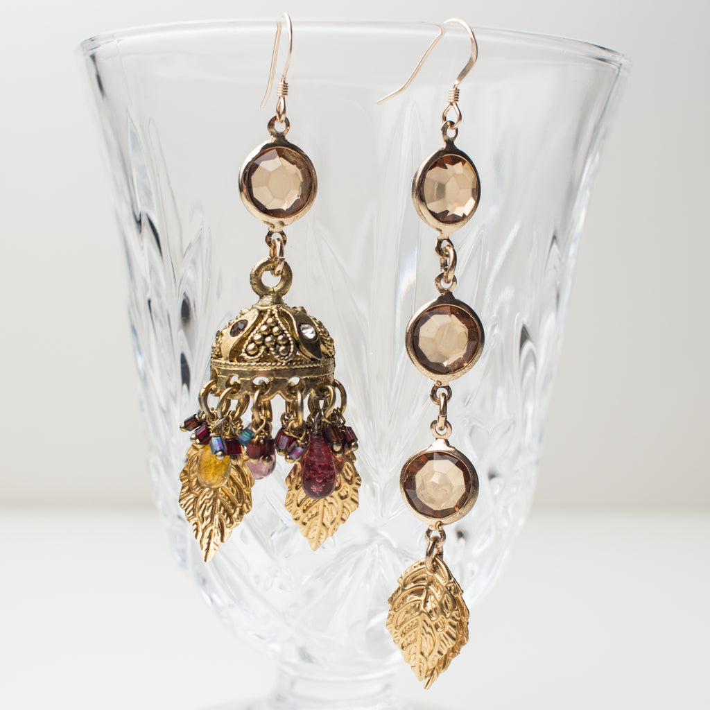 Gold Chandelier Earrings with amber, golden leaves and multi coloured charms in a Mismatch upcycle Style
