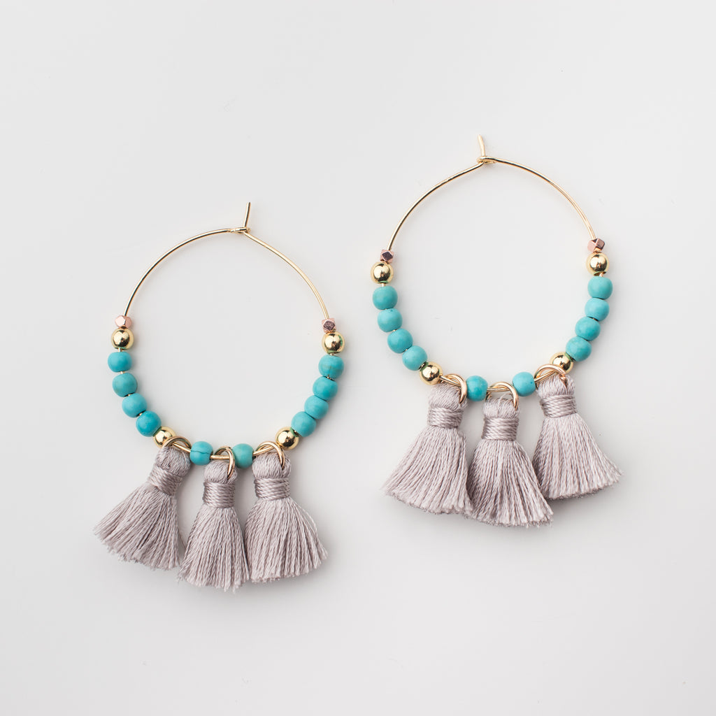Grey tassel hoop earrings with turquoise  magnesite gemstones and gold beads in matching style