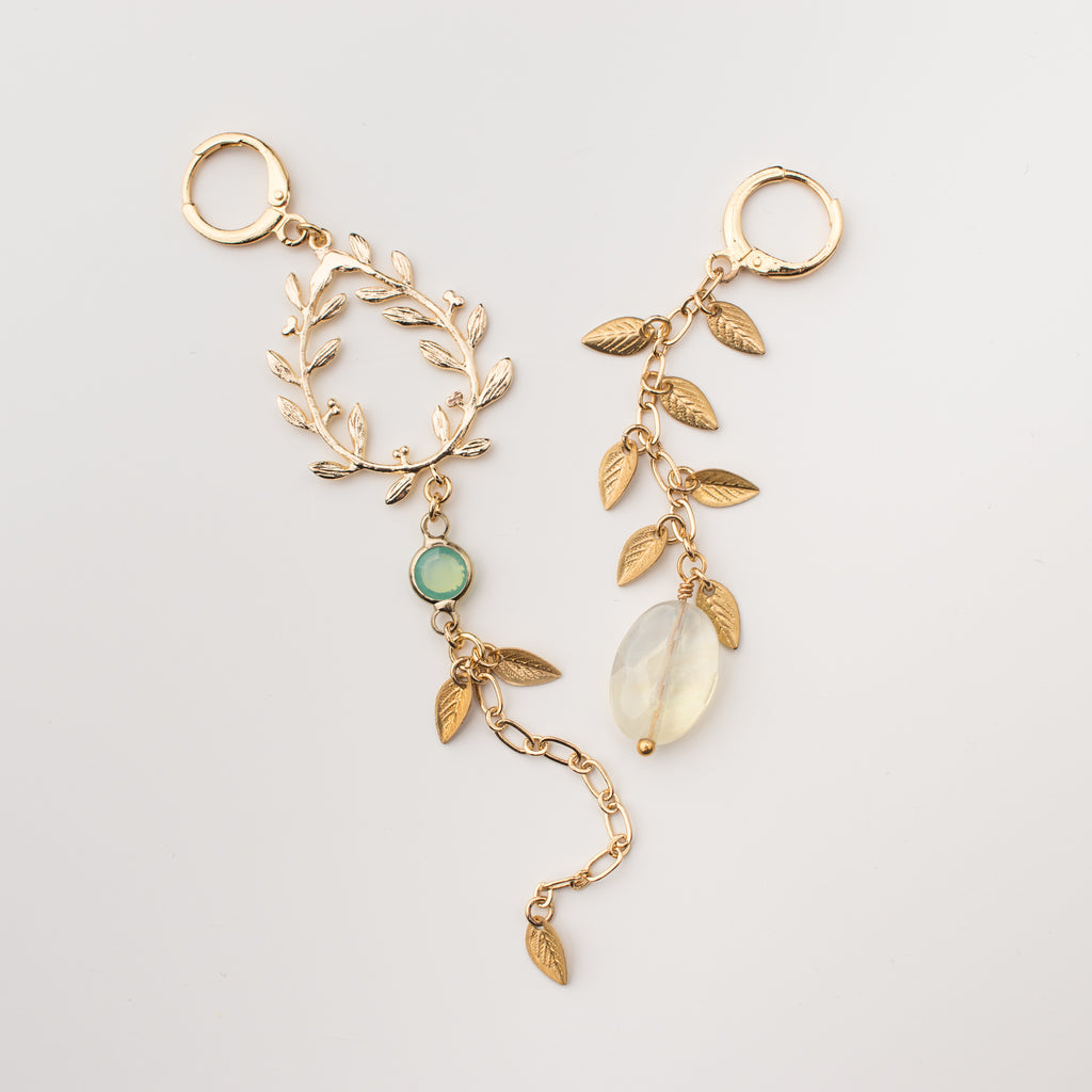 Gold vine leaves with chalcedony and upcycled gemstones earrings in a mismatched style. 