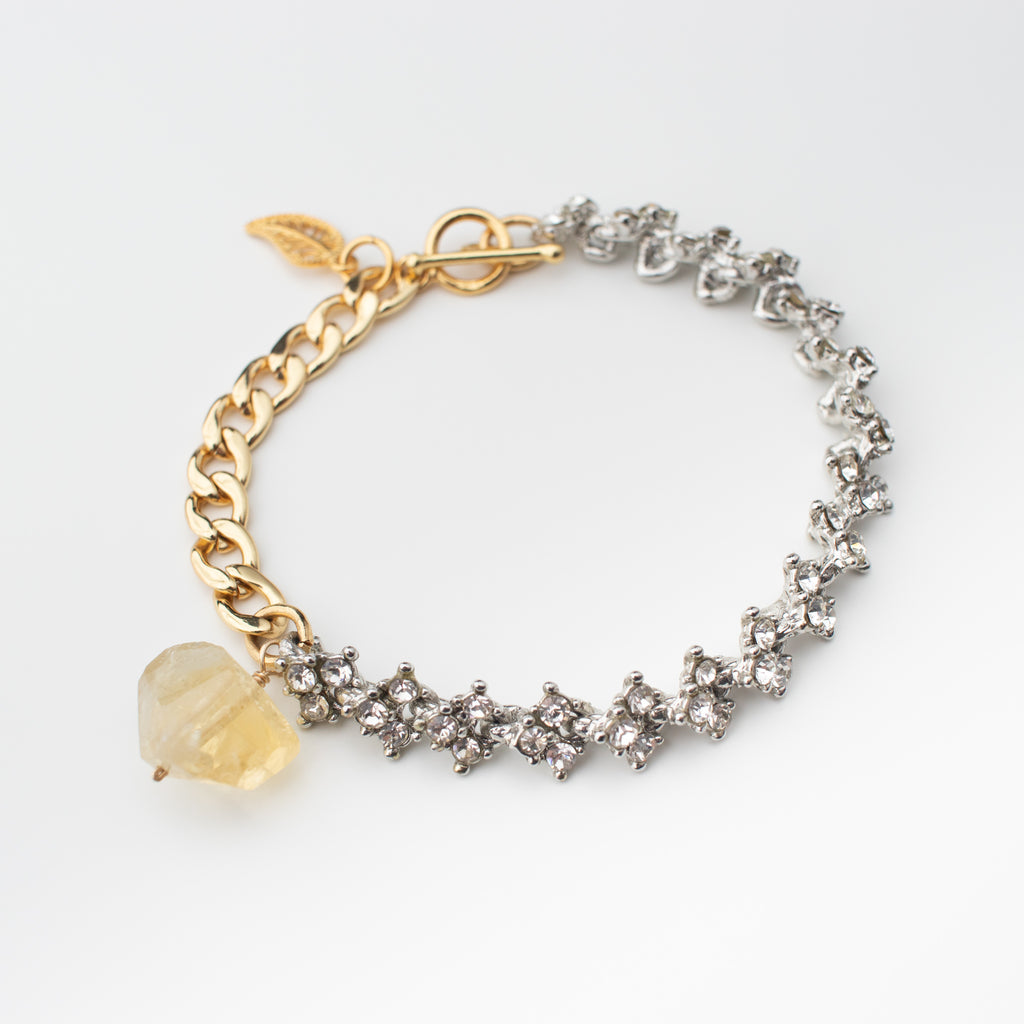 Citrine bracelet with recycled rhinestone chain,  18k gold plated 925 sterling silver toggle clasp and leaf,  faceted yellow citrine gemstone and 18k gold plated new chain. 